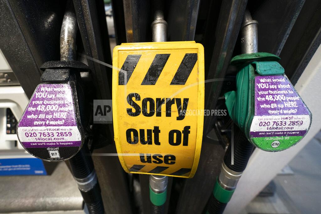 Jon Super An out of use sign is seen on a pump at a petrol station after the current outbreak of fuel panic buying in the UK, in Manchester, England Monday, Sept. 27, 2021. British Prime Minister Boris Johnson is said to be considering whether to call in the army to deliver fuel to petrol stations as pumps ran dry after days of panic buying. ( AP Photo/Jon Super)