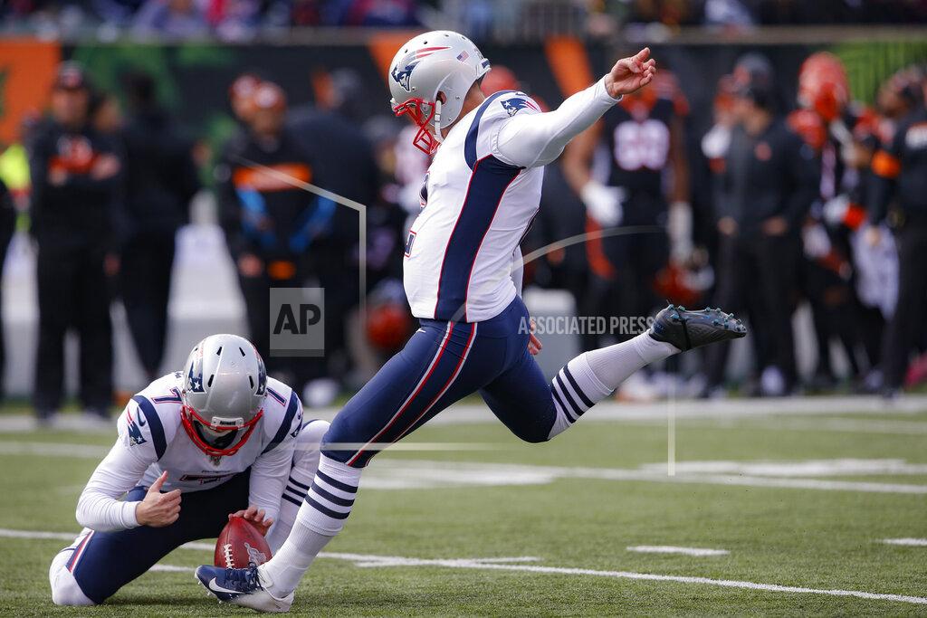 Gary Landers New England Patriots kicker Nick Folk, center, kicks an extra point in the first half of an NFL football game against the Cincinnati Bengals, Sunday, Dec. 15, 2019, in Cincinnati. (AP Photo/Gary Landers)