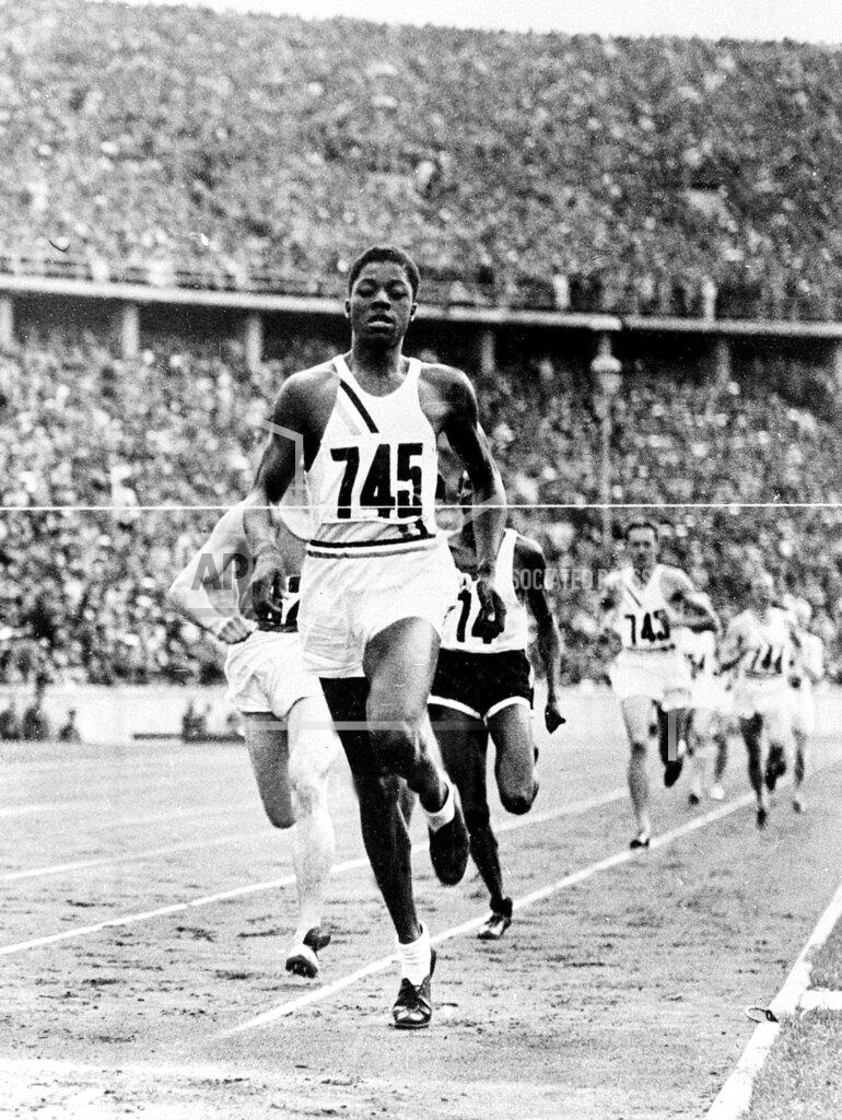 Uncredited FILE - In this Aug. 8, 1936 file photo, John Woodruff, a freshman at the University of Pittsburgh, wins the 800-meter race at the Olympic Games in Berlin. (AP Photo/File)