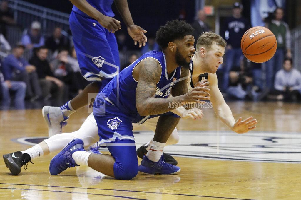 Darron Cummings Seton Hall's Myles Powell and Butler's Paul Jorgensen battle for a loose ball during the second half of an NCAA college basketball game, Saturday, Feb. 2, 2019, in Indianapolis. Butler won 70-68. (AP Photo/Darron Cummings)
