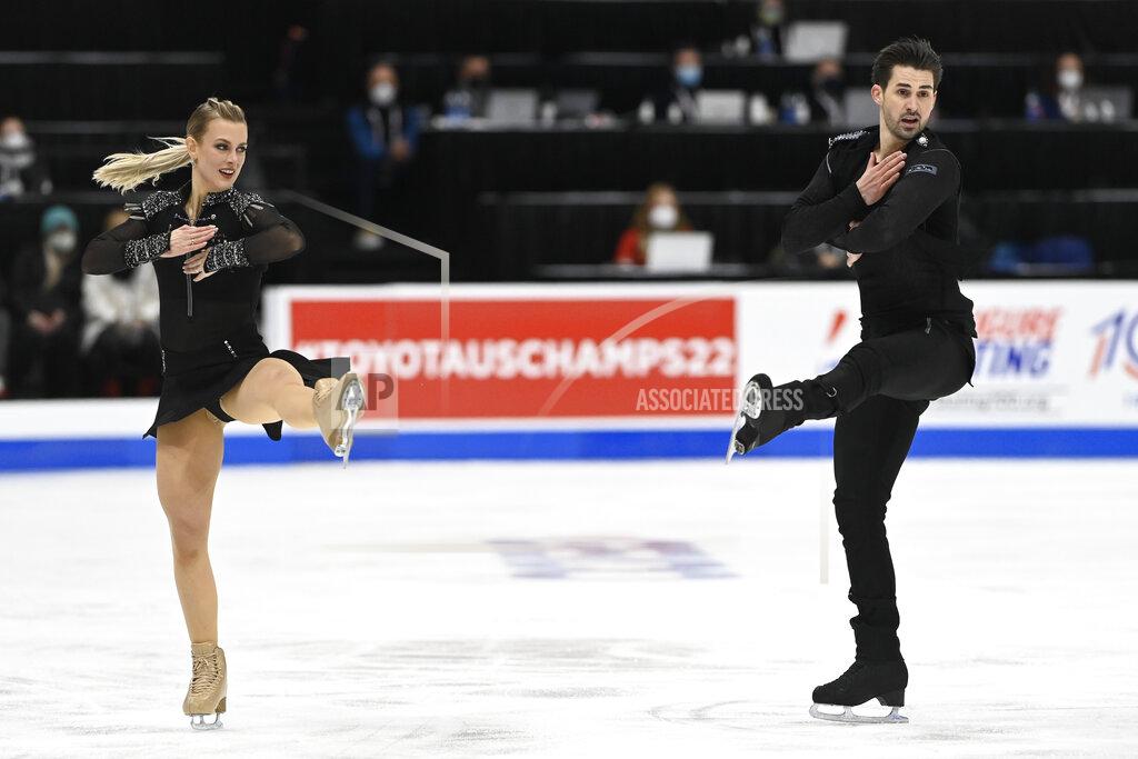 Mark Zaleski Madison Hubbell and Zachary Donohue compete in the rhythm dance program during the U.S. Figure Skating Championships Friday, Jan. 7, 2022, in Nashville, Tenn. (AP Photo/Mark Zaleski)