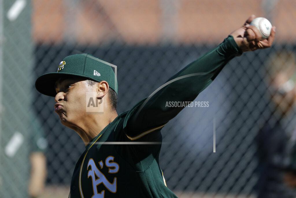 Darron Cummings Oakland Athletics' Jesus Luzardo throws during spring training baseball practice, Thursday, Feb. 13, 2020, in Mesa, Ariz. (AP Photo/Darron Cummings)
