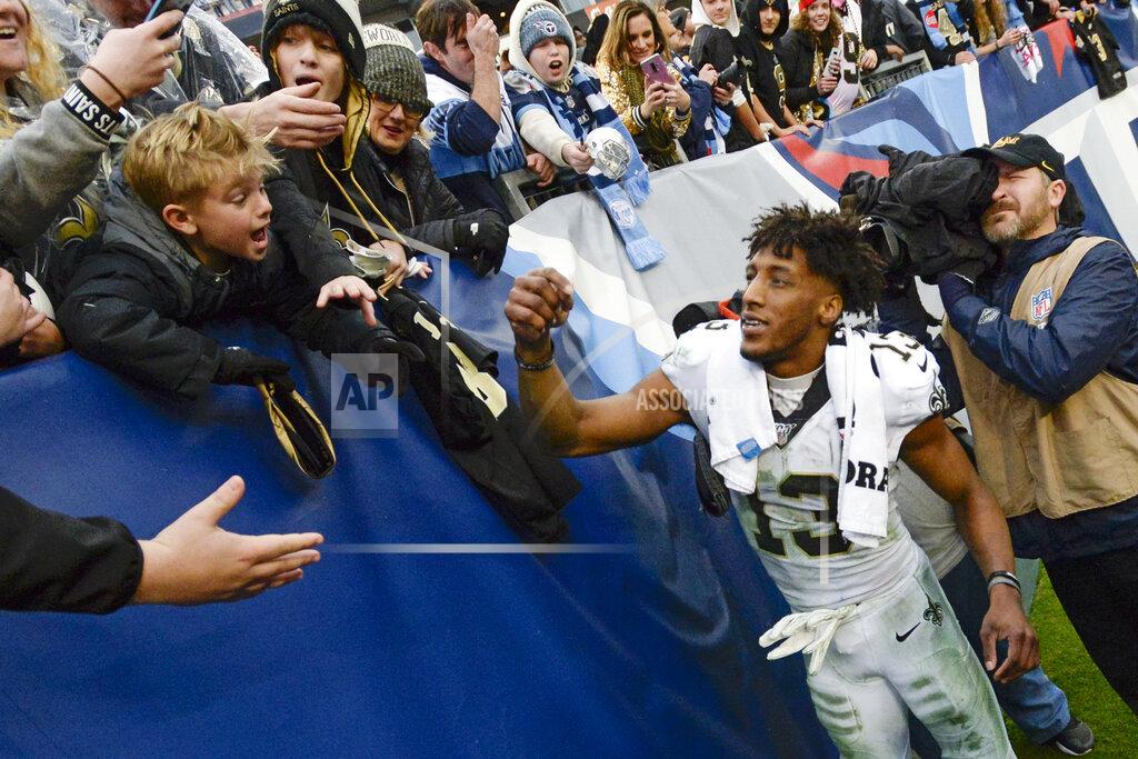 Mark Zaleski New Orleans Saints wide receiver Michael Thomas signs autographs after an NFL football game against the Tennessee Titans Sunday, Dec. 22, 2019, in Nashville, Tenn. The Saints won 38-28. (AP Photo/Mark Zaleski)