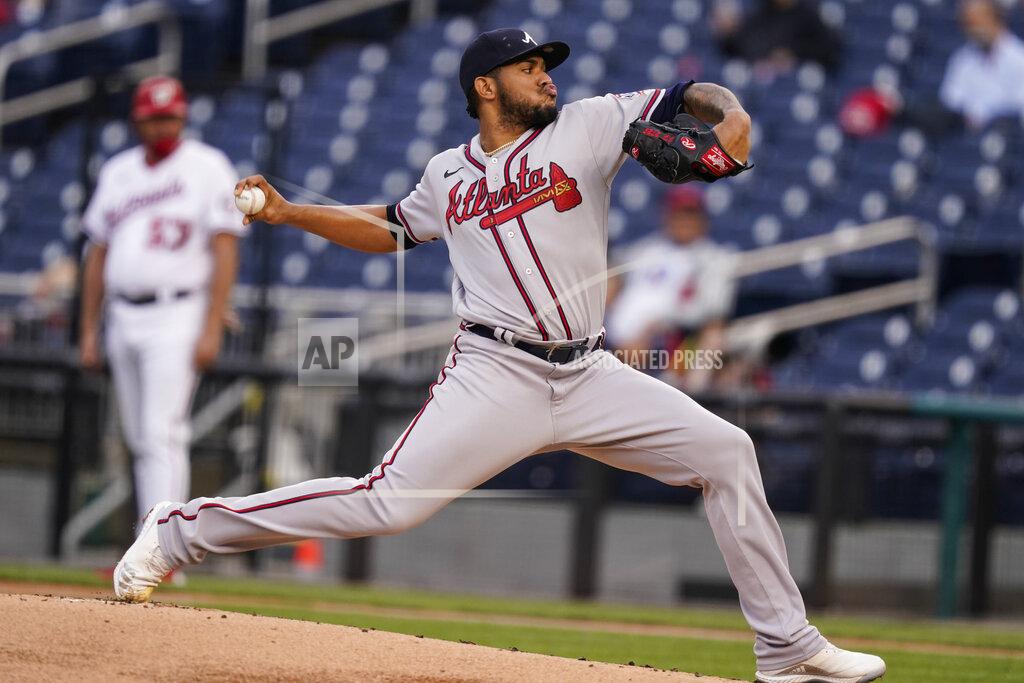 Alex Brandon Atlanta Braves starting pitcher Huascar Ynoa throws during the first inning of baseball game against the Washington Nationals at Nationals Park, Tuesday, May 4, 2021, in Washington. (AP Photo/Alex Brandon)