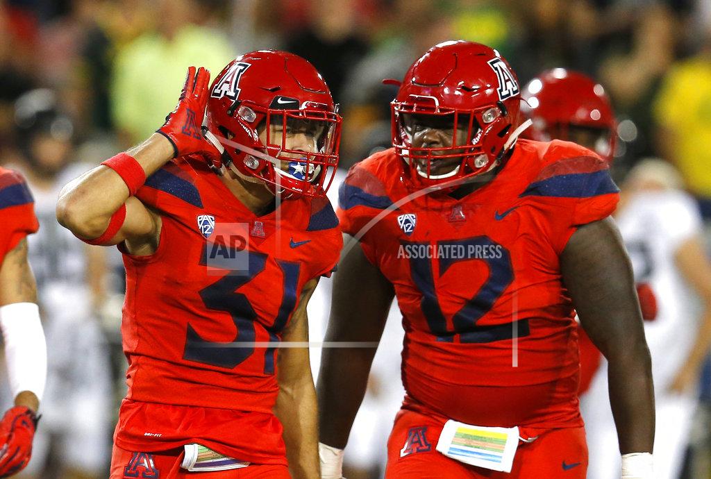 Rick Scuteri Arizona safety Tristan Cooper (31) celebrates with JB Brown after defeating Oregon 44-15 during an NCAA college football game, Saturday, Oct. 27, 2018, in Tucson, Ariz. Arizona defeated Oregon 44-15. (AP Photo/Rick Scuteri)
