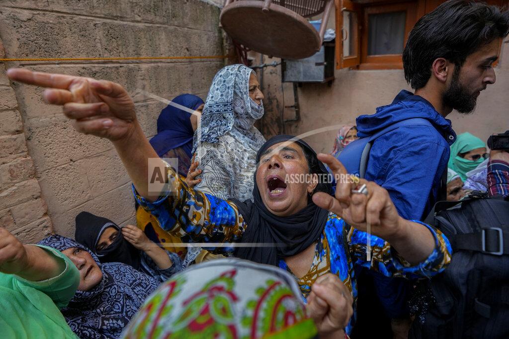 Mukhtar Khan A woman shouts slogans demanding release of Kashmiri separatist leader Yasin Malik during a protest in Srinagar, Indian controlled Kashmir, Wednesday, May 25, 2022. Shops and business establishment in some parts of Srinagar remained closed ahead of the sentence hearing of Kashmiri separatist leader Yasin Malik. Malik is being tried on charges of terrorist acts, raising funds, conspiracy, a member of a terrorist organization, and criminal conspiracy and sedition. (AP Photo/Mukhtar Khan)