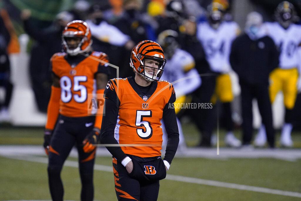 Michael Conroy Cincinnati Bengals quarterback Ryan Finley (5) looks to the sideline during the first half of an NFL football game against the Pittsburgh Steelers, Monday, Dec. 21, 2020, in Cincinnati. (AP Photo/Michael Conroy)