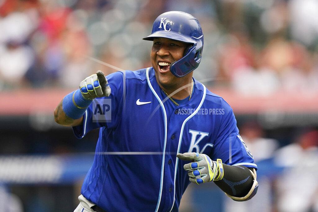 Tony Dejak Kansas City Royals' Salvador Perez smiles and points to the dugout after hitting a two-run home run in the fifth inning in the first baseball game of a doubleheader against the Cleveland Indians, Monday, Sept. 20, 2021, in Cleveland. The home run broke Johnny Bench's record for the most home runs in a season by a primary catcher. (AP Photo/Tony Dejak)
