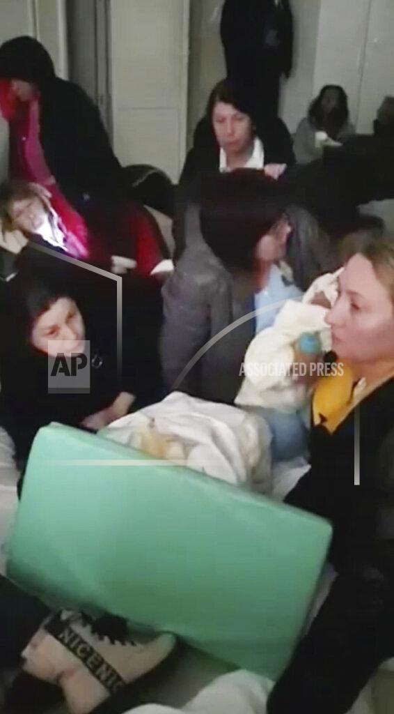 Vitalii Gyrin In this image from video provided by Dr. Vitalii Gyrin , staff and patients take shelter in a basement of the Adonis hospital in Kyiv, Ukraine, ahead of evacuation, as fighting broke out outside including airstrikes on Feb. 28, 2022. (Dr. Vitalii Gyrin via AP)