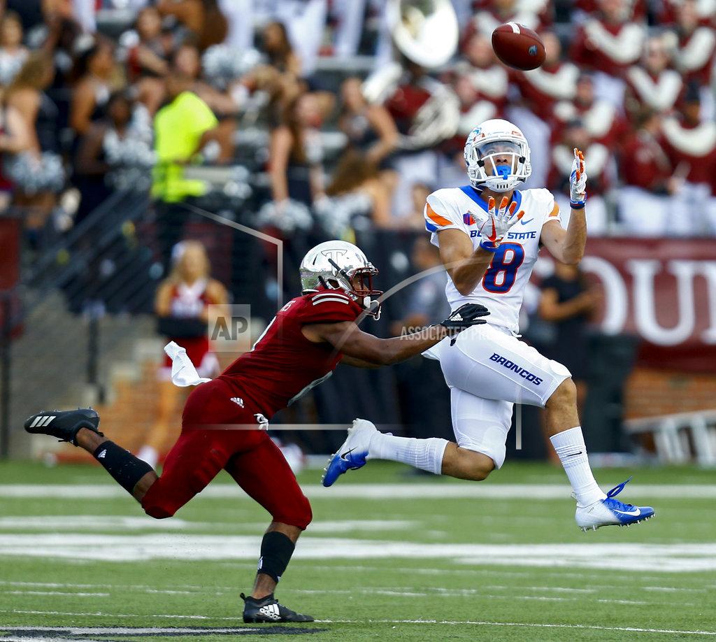 Butch Dill Boise State wide receiver Sean Modster, right, catches a pass as Troy cornerback Marcus Jones, left, tries to defend during the first half of an NCAA college football game, Saturday, Sept. 1, 2018, in Troy, Ala. (AP Photo/Butch Dill)