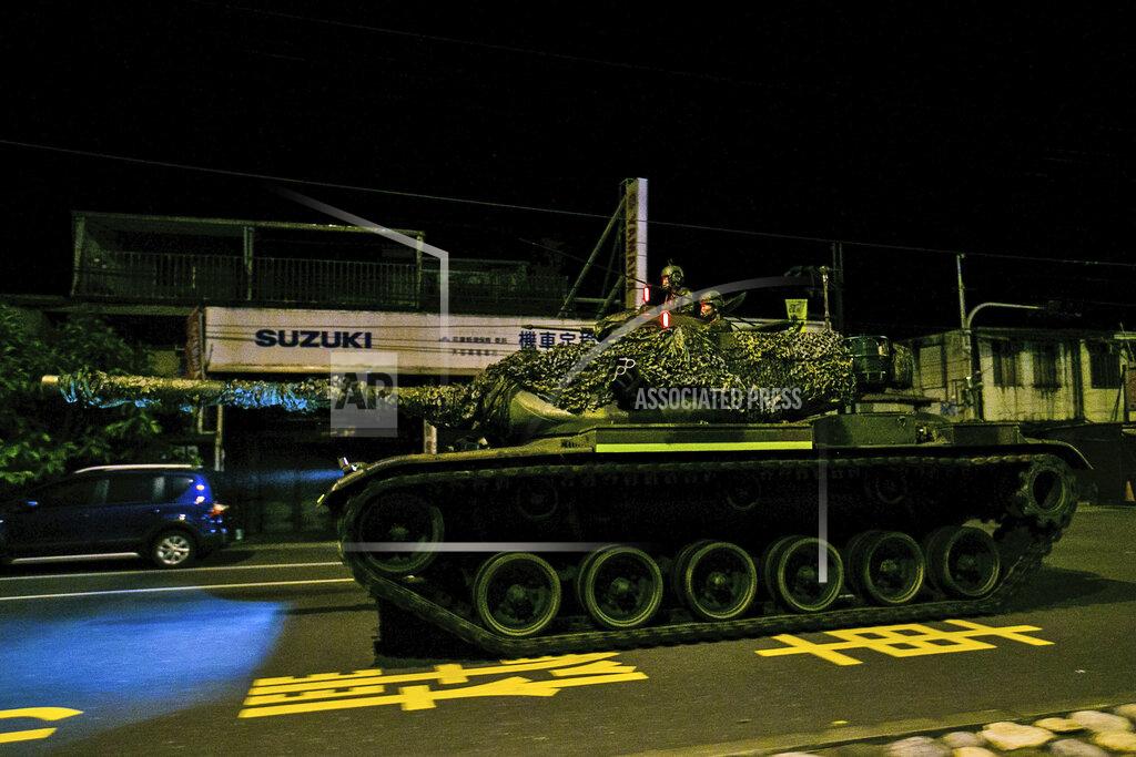 Uncredited In this photo released by the Military News Agency, a tank prepares to take part in the annual Han Kuang live-fire drills in Hualian, eastern Taiwan in the early hours of Tuesday, Sept. 14, 2021. (Military News Agency via AP)