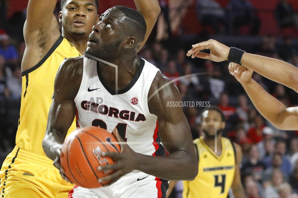 Jenn Finch Georgia forward Derek Ogbeide (34) looks for a shot against Kennesaw State during an NCAA college basketball game in Athens, Ga., Tuesday, Nov. 27, 2018. (Jenn Finch/Athens Banner-Herald via AP)