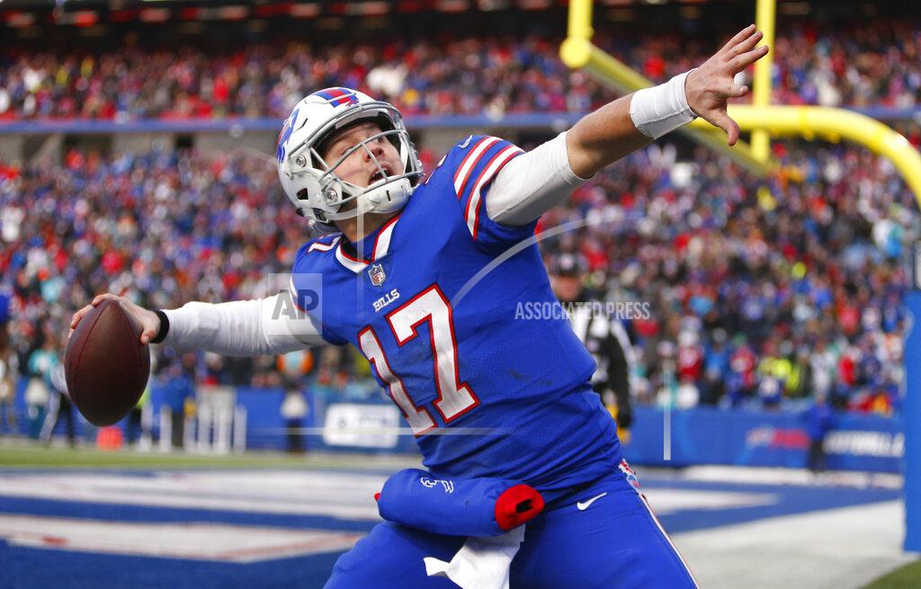 Jeffrey T. Barnes FILE - In this Dec. 30, 2018, file photo, Buffalo Bills quarterback Josh Allen celebrates his touchdown during the second half of an NFL football game against the Miami Dolphins in Orchard Park, N.Y. Allen took it upon himself to be the Bills' one-man welcome committee in sending a text to each of the Bills' numerous free agent additions last month. (AP Photo/Jeffrey T. Barnes, File)