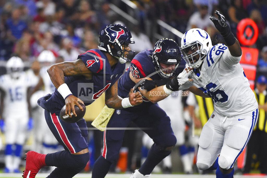 Eric Christian Smith Houston Texans quarterback Deshaun Watson (4) is pressured by Indianapolis Colts defensive tackle Denico Autry (96) during the first half of an NFL football game Thursday, Nov. 21, 2019, in Houston. (AP Photo/Eric Christian Smith)
