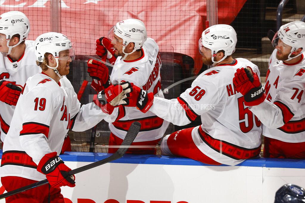 Joel Auerbach Carolina Hurricanes defenseman Dougie Hamilton (19) is congratulated for his second goal of the night, during the second period of the team's NHL hockey game against the Florida Panthers, Saturday, April 24, 2021, in Sunrise, Fla. (AP Photo/Joel Auerbach)