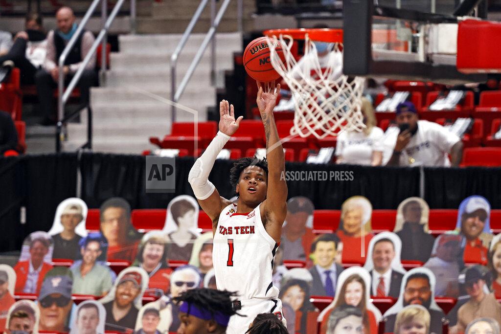 Brad Tollefson Texas Tech's Terrence Shannon Jr. (1) shoots the ball during the first half of an NCAA college basketball game against Kansas State, Tuesday, Jan. 5, 2021, in Lubbock, Texas. (AP Photo/Brad Tollefson)