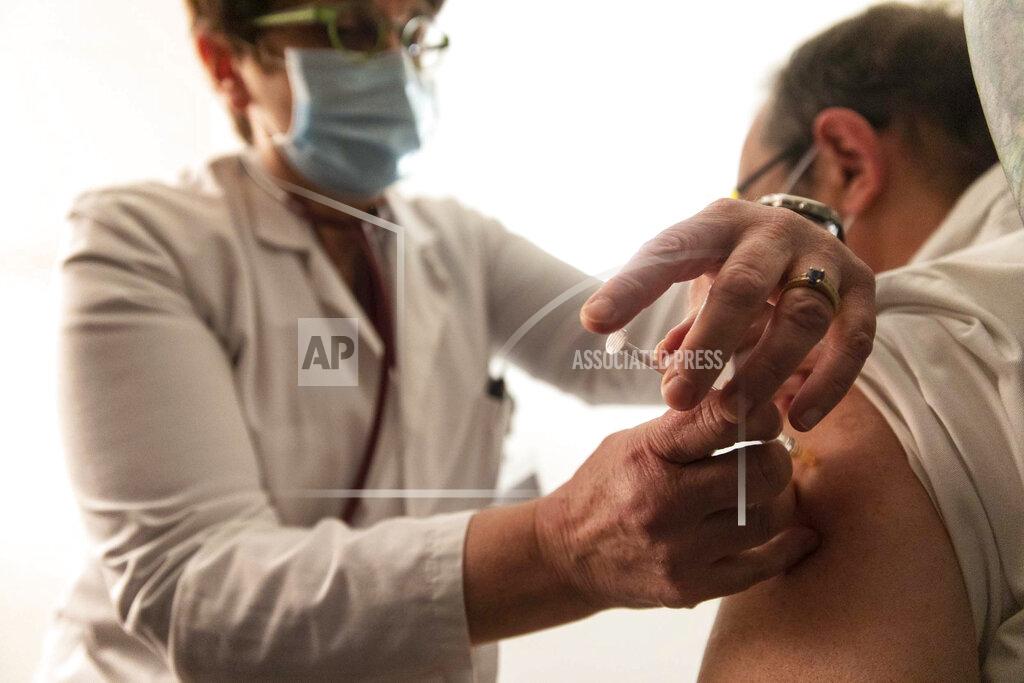 Jean-Francois Badias A patient is injected with the coronavirus vaccine at a clinic in Strasbourg, eastern France, Monday Jan. 4, 2021. (Jean-François Badias / AP)