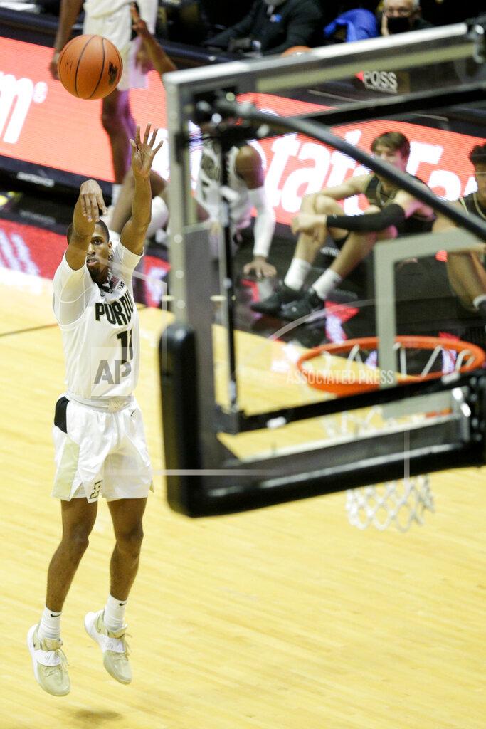 Nikos Frazier Purdue guard Isaiah Thompson (11) shoots during the first half of an NCAA college basketball game against Oakland Tuesday, Dec. 1, 2020 in West Lafayette, Ind. (Nikos Frazier/Journal & Courier via AP)