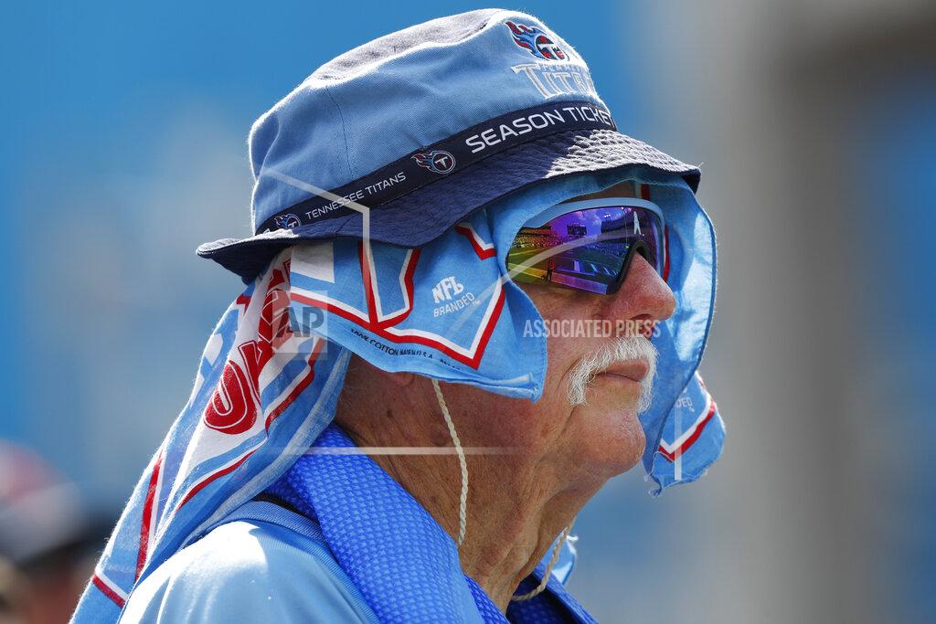 Wade Payne A Tennessee Titans fan watches as the Titans play the Indianapolis Colts in temperatures over 100 degrees during an NFL football game Sunday, Sept. 15, 2019, in Nashville, Tenn. (AP Photo/Wade Payne)