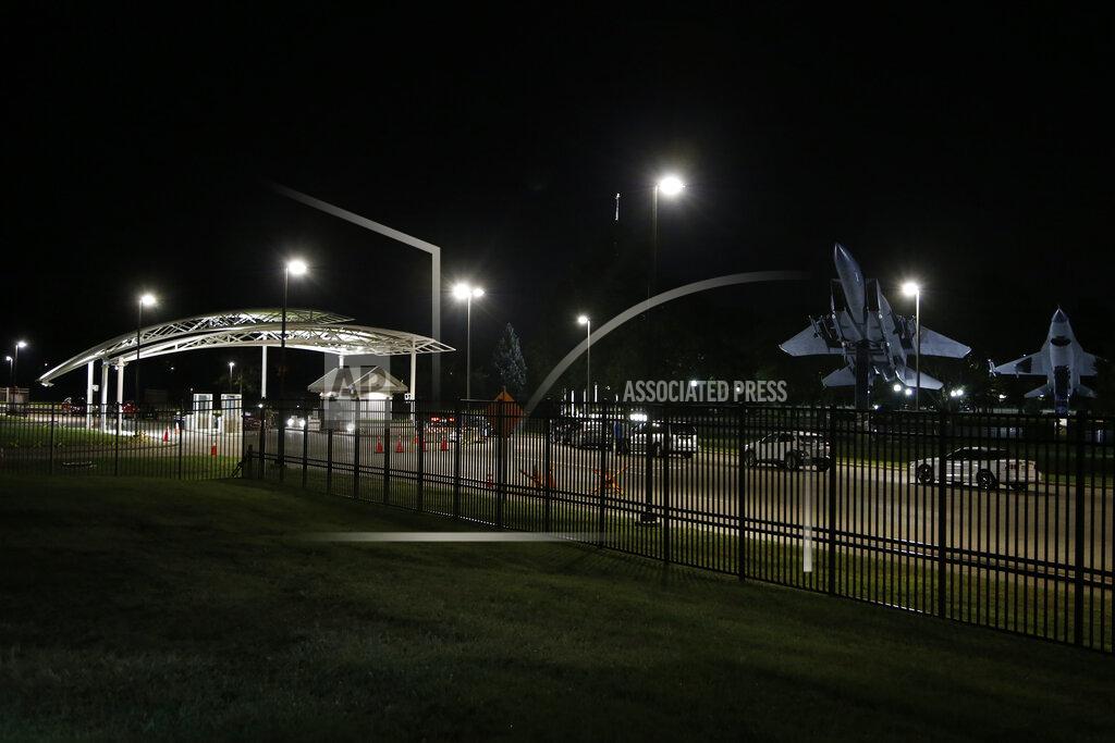 Jay Laprete People wait in their cars inside the main gate of Wright-Patterson Air Force Base during a lockdown Friday, Sept. 10, 2021, in Dayton, Ohio. The base was put on lockdown due to a report of an active shooter but was later given the all clear. (AP Photo/Jay LaPrete)