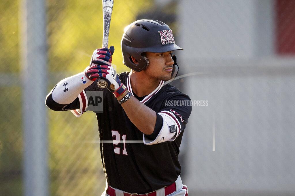 Stephen Brashear CORRECTS THAT GONZALES PLAYS FOR NEW MEXICO STATE, NOT SEATTTLE - FILE - In this May 10, 2019, file photo, New Mexico State's Nick Gonzales waits for a pitch during an at-bat in an NCAA college baseball game against Seattle University, in Bellevue, Wash. Gonzales is expected to be an early selection in the Major League Baseball draft. (AP Photo/Stephen Brashear, File)