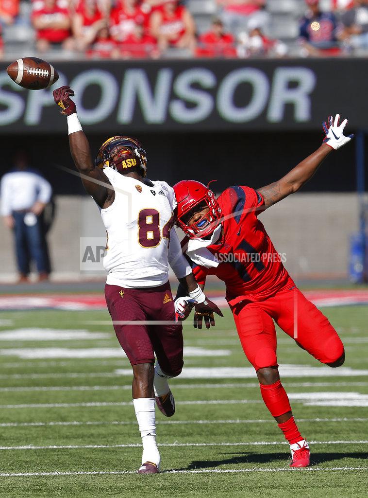 Rick Scuteri Arizona safety Troy Young (11) gets called for holding Arizona State wide receiver Frank Darby (84) in the first half during an NCAA college football game, Saturday, Nov. 24, 2018, in Tucson, Ariz. (AP Photo/Rick Scuteri)