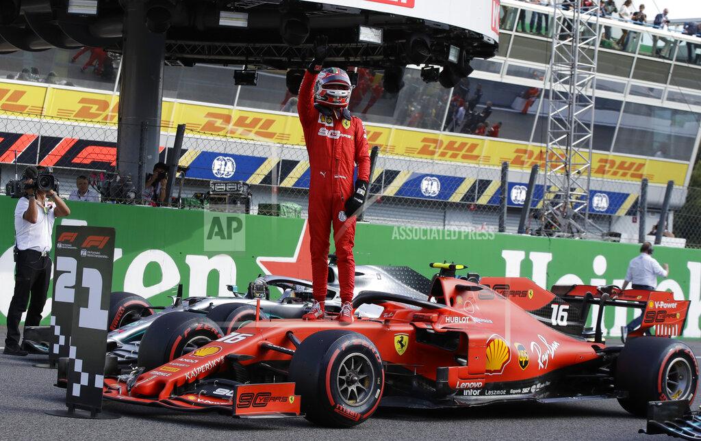 Luca Bruno Ferrari driver Charles Leclerc of Monaco celebrates taking pole position during the qualifying session at the Monza racetrack, in Monza, Italy, Saturday, Sept. 7, 2019. The Formula one race will be held on Sunday. (AP Photo/Luca Bruno)