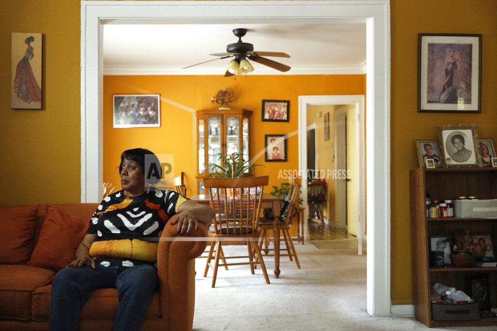 Shafkat Anowar Lifelong Evanston resident Jo-Ann Cromer poses for a portrait in her home in Evanston, Ill., Wednesday, May 5, 2021. The Chicago suburb is preparing to pay reparations in the form of housing grants to Black residents who experienced housing discrimination. Cromer plans on applying. (AP Photo/Shafkat Anowar)