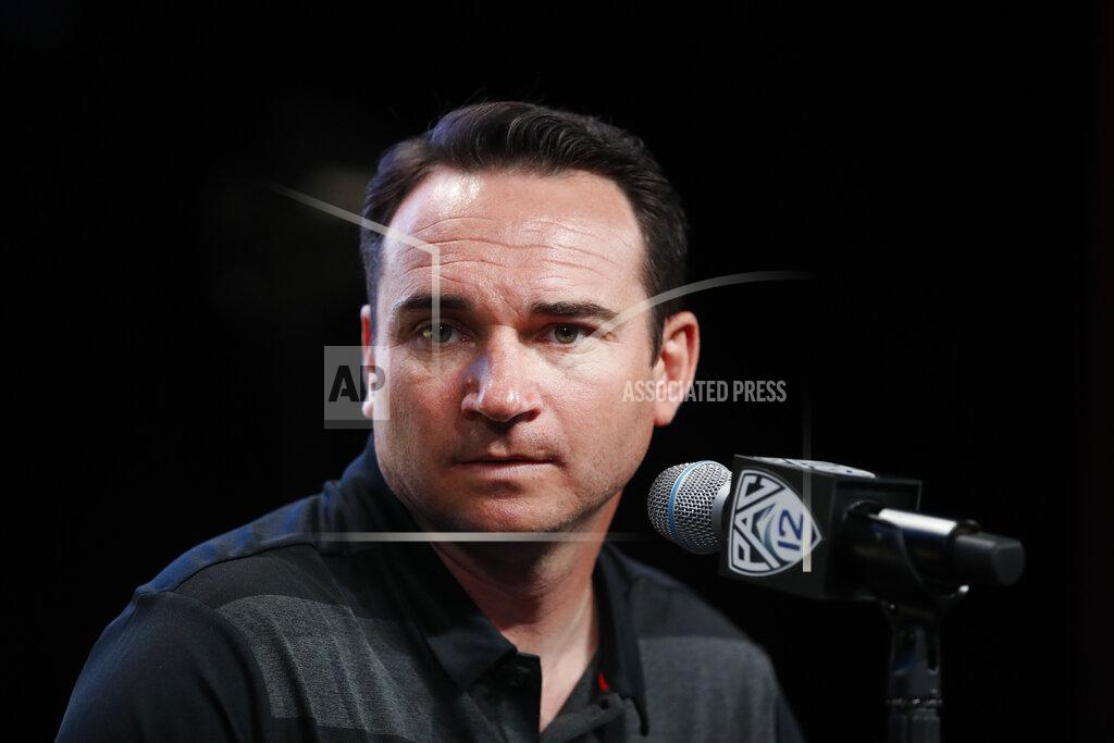 Jae C. Hong In this July 25, 2018 photo Oregon State head coach Jonathan Smith speaks at the Pac-12 Conference NCAA college football Media Day in Los Angeles. Oregon State’s players headed into fall camp are wearing orange wristbands stamped with the word “urgency.” That’s the theme for the Beavers as they embark on their second year under coach Jonathan Smith. The team is looking for an urgent turnaround after going 2-10 in Smith’s debut season. (AP Photo/Jae C. Hong)