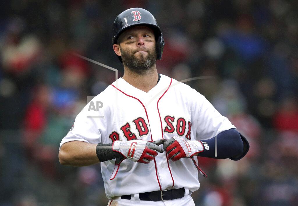 Charles Krupa Boston Red Sox's Dustin Pedroia takes off his gloves after lining out to right field to end the sixth inning of the home opener baseball game against the Toronto Blue Jays, Tuesday, April 9, 2019, in Boston. (AP Photo/Charles Krupa)