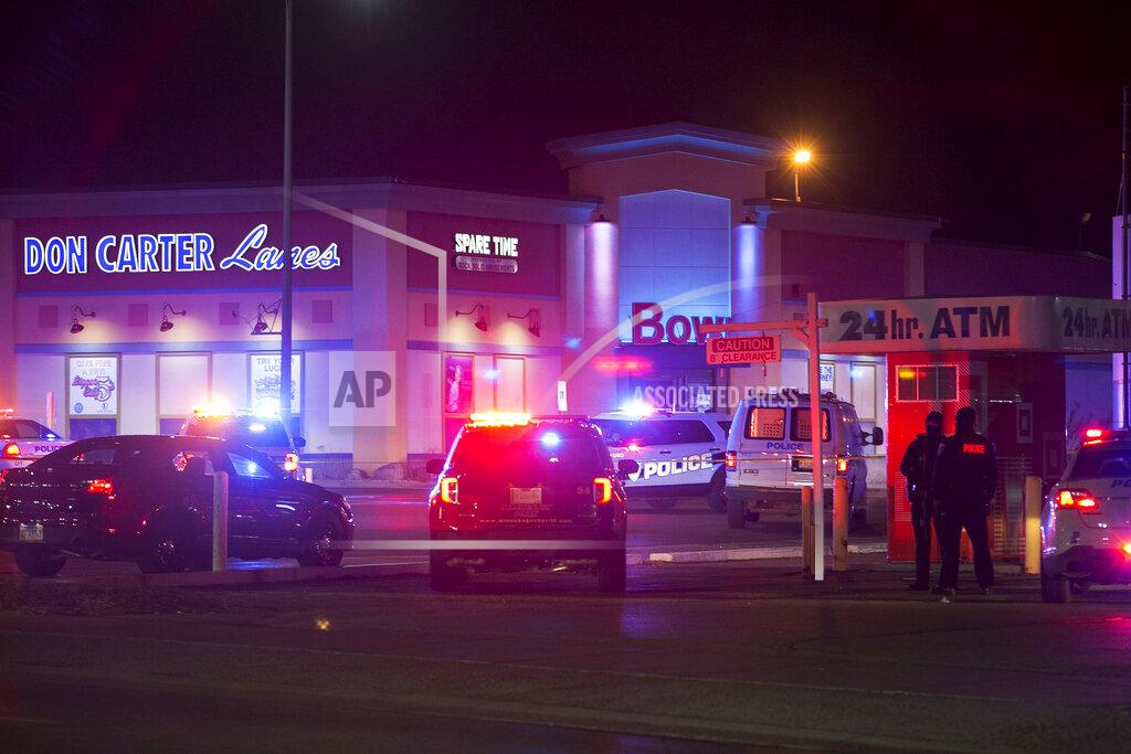 Scott P. Yates Rockford police and other law enforcement agencies investigate the scene of a shooting at bowling alley Don Carter Lanes on Saturday, Dec. 26, 2020, in Rockford, Ill. (Scott P. Yates/Rockford Register Star via AP)
