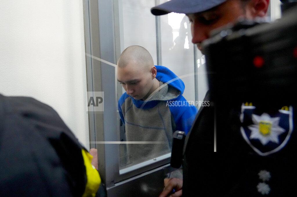 Efrem Lukatsky Russian army Sergeant Vadim Shishimarin, 21, arrives for a court hearing in Kyiv, Ukraine, Friday, May 13, 2022. The trial of a Russian soldier accused of killing a Ukrainian civilian opened Friday, the first war crimes trial since Moscow's invasion of its neighbor. (AP Photo/Efrem Lukatsky)