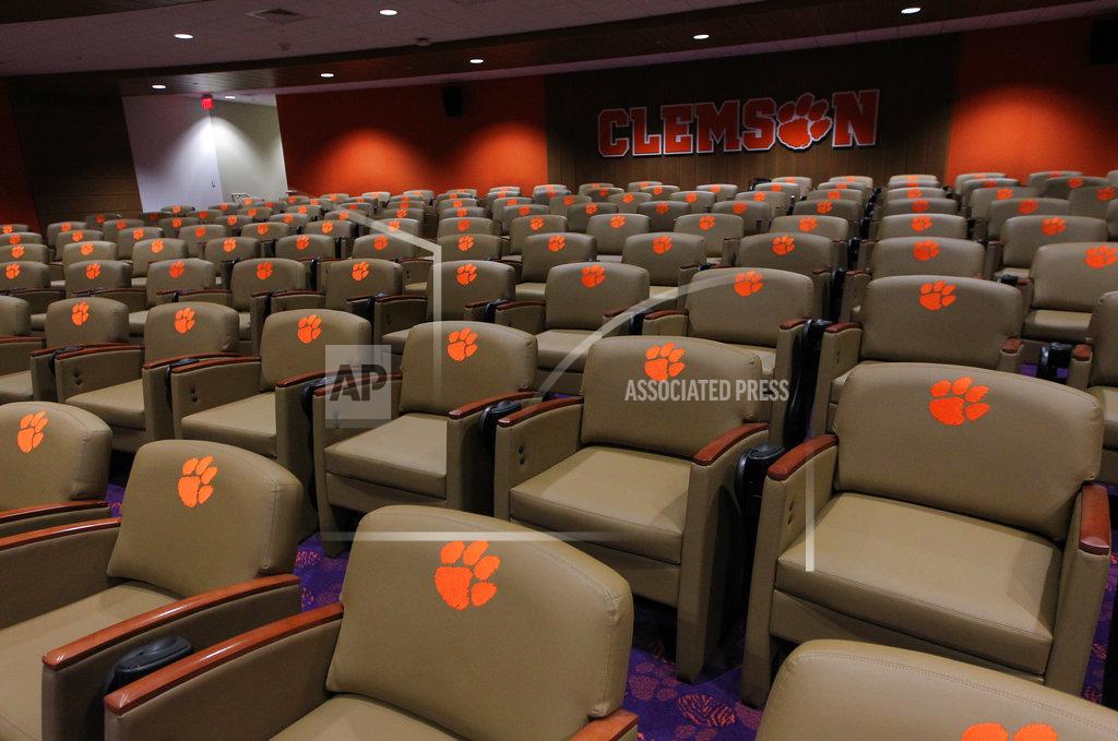 Ken Ruinard This Jan. 31, 2017 photo, shows a team meeting room inside the Clemson Football Facility at Clemson University in Clemson, S.C. When it comes to facilities in the ACC, Clemson has set the standard. The Tigers opened a $55 million team headquarters two years ago that includes a miniature golf course, a slide and a nap room. With the team pursuing its fourth straight ACC title and College Football Playoff berth, they feel the investment is paying off. (Ken Ruinard/The Independent-Mail via AP)