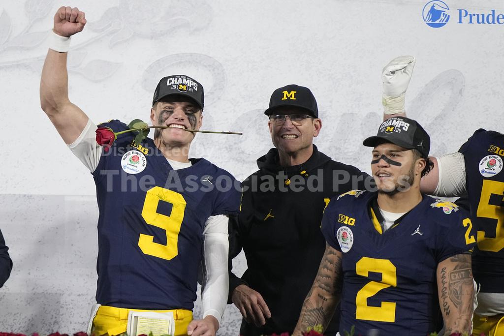 Harbaugh's Michigan Wolverines to play for national tit... - Vimarsana News