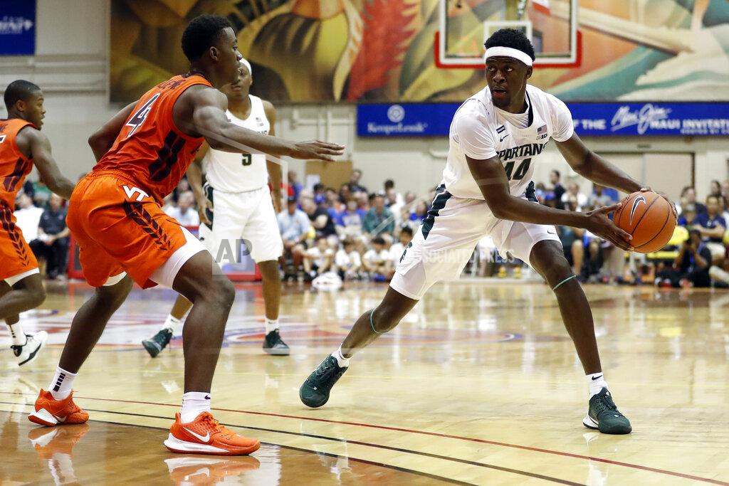 Marco Garcia Michigan State forward Gabe Brown (44) tries to get around Virginia Tech guard Nahiem Alleyne (4) during the first half of an NCAA college basketball game Monday, Nov. 25, 2019, in Lahaina, Hawaii. (AP Photo/Marco Garcia)