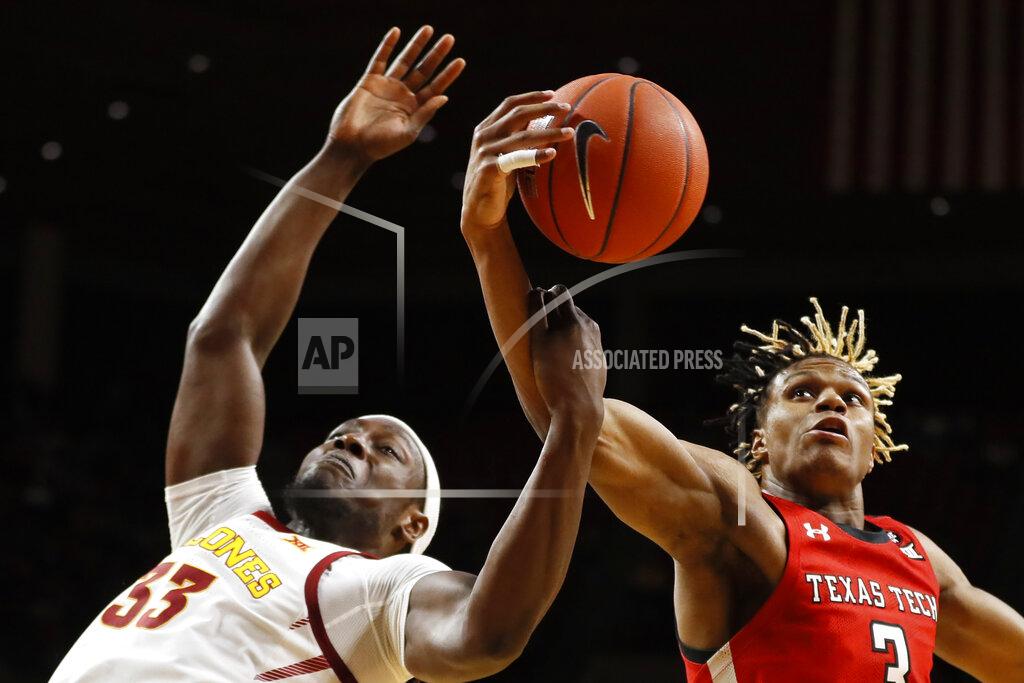 Charlie Neibergall Texas Tech guard Jahmi'us Ramsey, right, grabs a rebound over Iowa State forward Solomon Young (33) during the first half of an NCAA college basketball game Saturday, Feb. 22, 2020, in Ames, Iowa. (AP Photo/Charlie Neibergall)