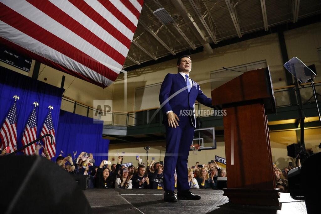 Democratic presidential candidate former South Bend, Ind., Mayor Pete Buttigieg pauses as he speaks to supporters at a primary night election rally at Nashua Community College, Tuesday, Feb. 11, 2020, in Nashua, N.H. (AP Photo/Andrew Harnik)
