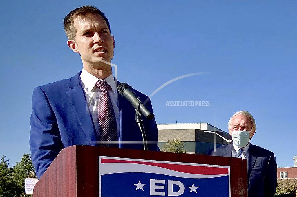 Charles Winokoor Democrat Jake Auchincloss, left, speaks at a campaign stop as U.S. Sen. Ed Markey, right, watches, Friday, Oct. 9, 2020, in Fall River, Mass. Auchincloss is a candidate in the 4th Congressional District race and Markey is the incumbent candidate in the Senate race in the Nov. 3 general election to represent Massachusetts. (Charles Winokoor/The Herald News of Fall River via AP)