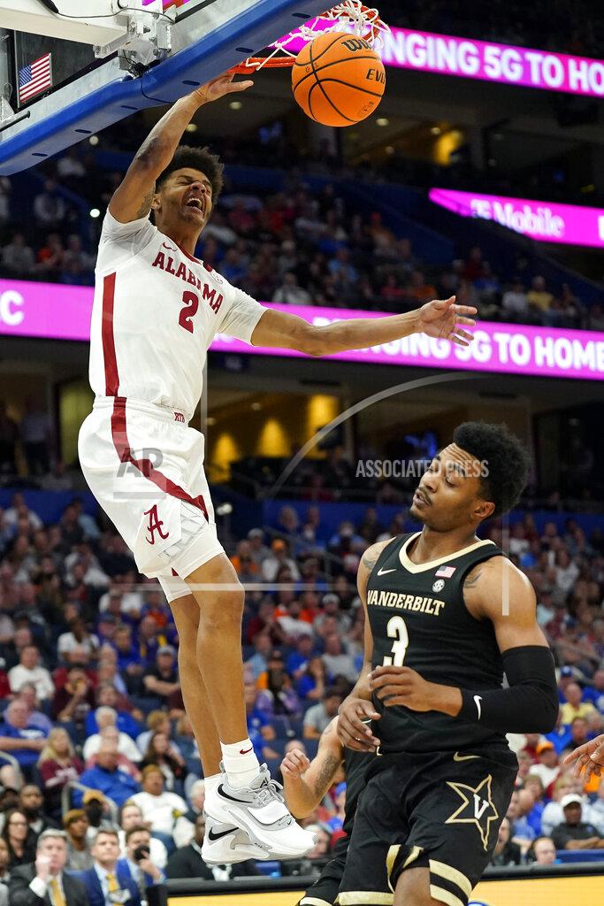 Chris O'meara Alabama forward Darius Miles (2) dunks over Vanderbilt guard Rodney Chatman (3) during the first half of an NCAA men's college basketball Southeastern Conference tournament game Thursday, March 10, 2022, in Tampa, Fla. (AP Photo/Chris O'Meara)