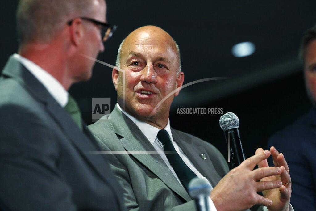 David Zalubowski Colorado State head coach Steve Addazio, back, chats with athletic director Joe Parker during an announcement that Addazio has been hired as the new head football coach at a news conference at the school Thursday, Dec. 12, 2019, in Fort Collins, Colo. (AP Photo/David Zalubowski)