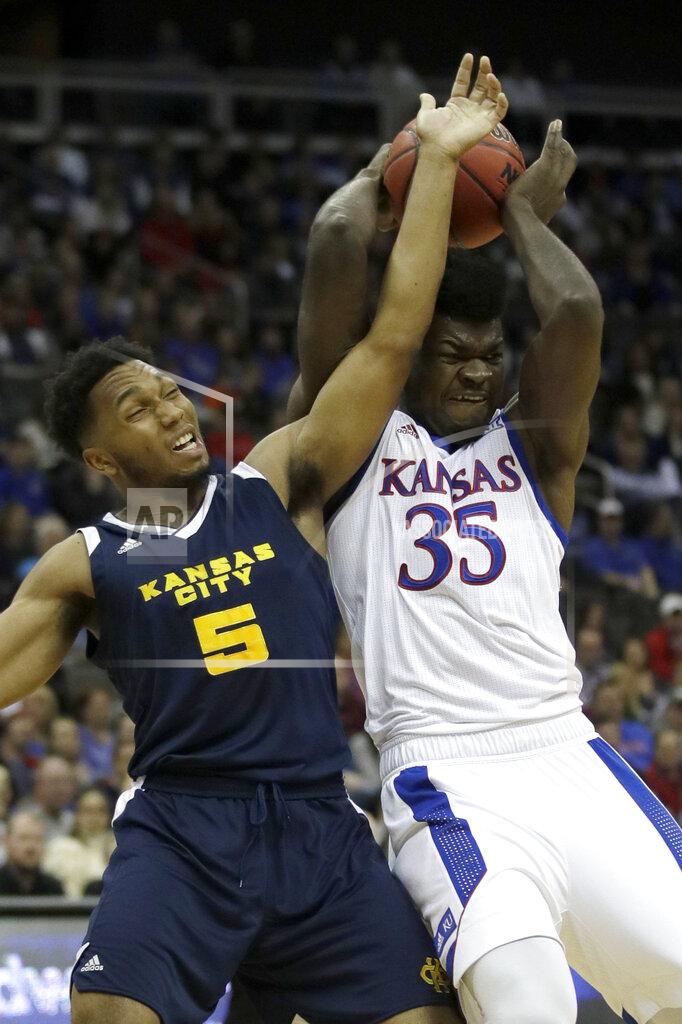 Orlin Wagner Kansas center Udoka Azubuike (35) rebounds against Kansas City forward Jordan Giles (5) during the first half of an NCAA college basketball game in Kansas City, Kan., Saturday, Dec. 14, 2019. (AP Photo/Orlin Wagner)