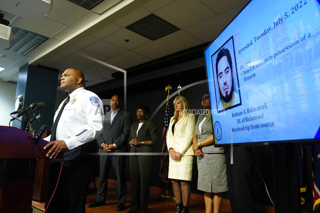 Steve Helber Richmond Police Chief Gerald M Smith, left, speaks during a press conference at Richmond Virginia Police headquarters, Wednesday July 6, 2022, in Richmond, Va. Police said Wednesday that they thwarted a planned July 4 mass shooting after receiving a tip that led to arrests and the seizure of multiple guns — an announcement that came just two days after a deadly mass shooting on the holiday in a Chicago suburb. AP Photo/Steve Helber)