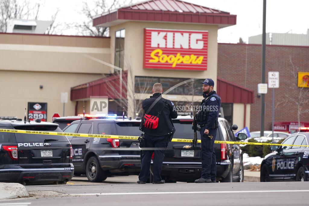 David Zalubowski FILE - In this March 22, 2021, file photo, police work on the scene outside of a King Soopers grocery store where a shooting took place in Boulder, Colo. A man charged with killing 10 people at the supermarket surrendered after being shot by a police officer who waited for him to come into view down a store aisle, according new information about the shooting released Thursday, May 6, 2021. The details were contained in a district attorney's report that found Boulder officer Richard Steidell was justified in shooting Ahmad Alissa and said his shots stopped the attack. (AP Photo/David Zalubowski, File)