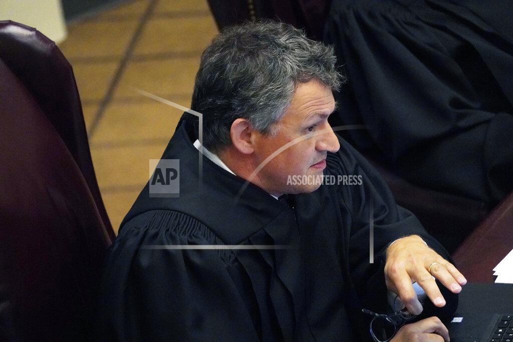 Rogelio V. Solis Mississippi Supreme Court Associate Justice Josiah Dennis Coleman questions attorneys presenting arguments over a lawsuit that challenges the state's initiative process and seeks to overturn a medical marijuana initiative that voters approved in November 2020, Wednesday, April 14, 2021, in Jackson, Miss. (AP Photo/Rogelio V. Solis)