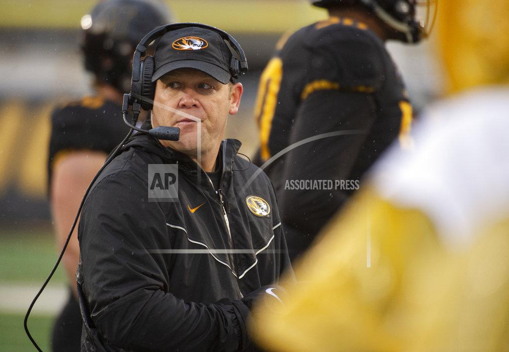 L.g. Patterson Missouri head coach Barry Odom watches his team play during the first half of an NCAA college football game against Arkansas Friday, Nov. 23, 2018, in Columbia, Mo. (AP Photo/L.G. Patterson)