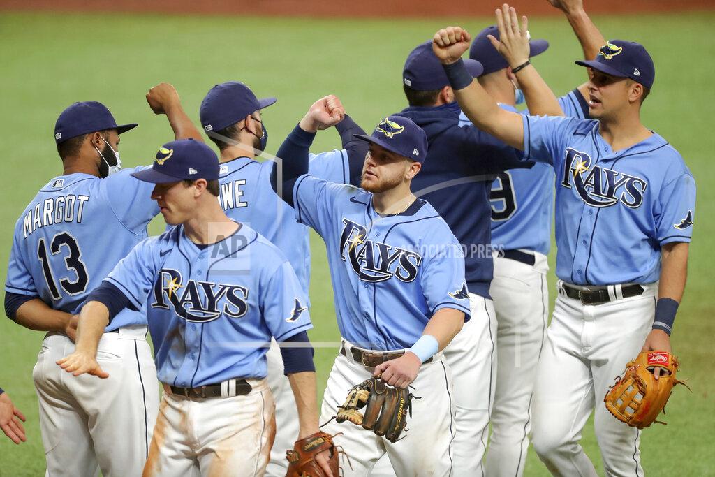 Mike Carlson Members of the Tampa Bay Rays celebrate a 5-0 win over the Philadelphia Phillies in a baseball game Sunday, Sept. 27, 2020, in St. Petersburg, Fla. (AP Photo/Mike Carlson)