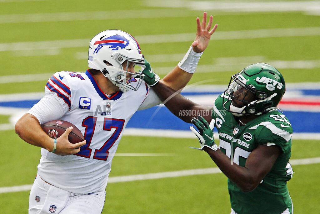 John Munson Buffalo Bills quarterback Josh Allen (17) is pushed out of bounds by New York Jets free safety Marcus Maye (20) during the first half of an NFL football game in Orchard Park, N.Y., Sunday, Sept. 13, 2020. (AP Photo/John Munson)