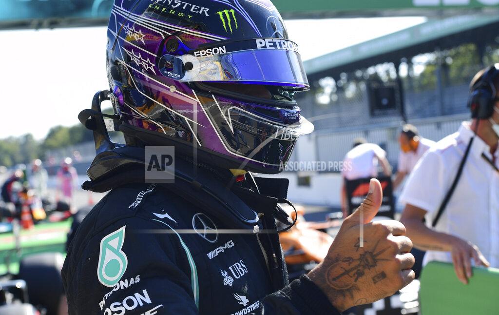 Jennifer Lorenzini Mercedes driver Lewis Hamilton of Britain celebrates after clocking the fastest time during the qualifying session for Sunday's Italian Formula One Grand Prix, at the Monza racetrack in Monza, Italy, Saturday, Sept. 5, 2020. (Jennifer Lorenzini/Pool via AP)