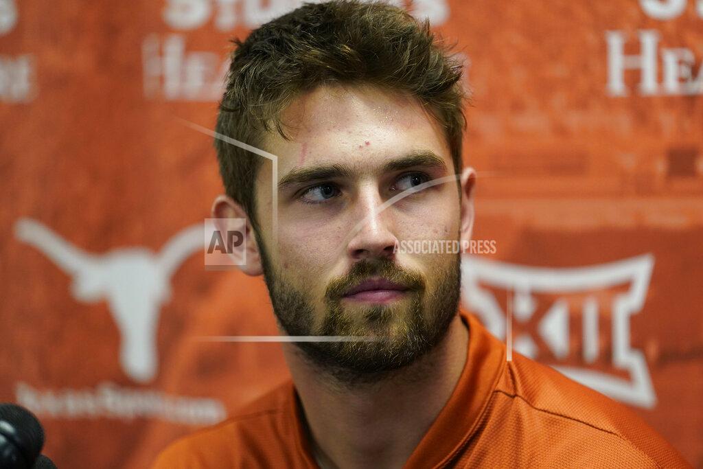 Eric Gay Texas NCAA college football quarterback Hudson Card talks to the media following a spring practice, Thursday, April 14, 2022, in Austin, Texas. (AP Photo/Eric Gay)