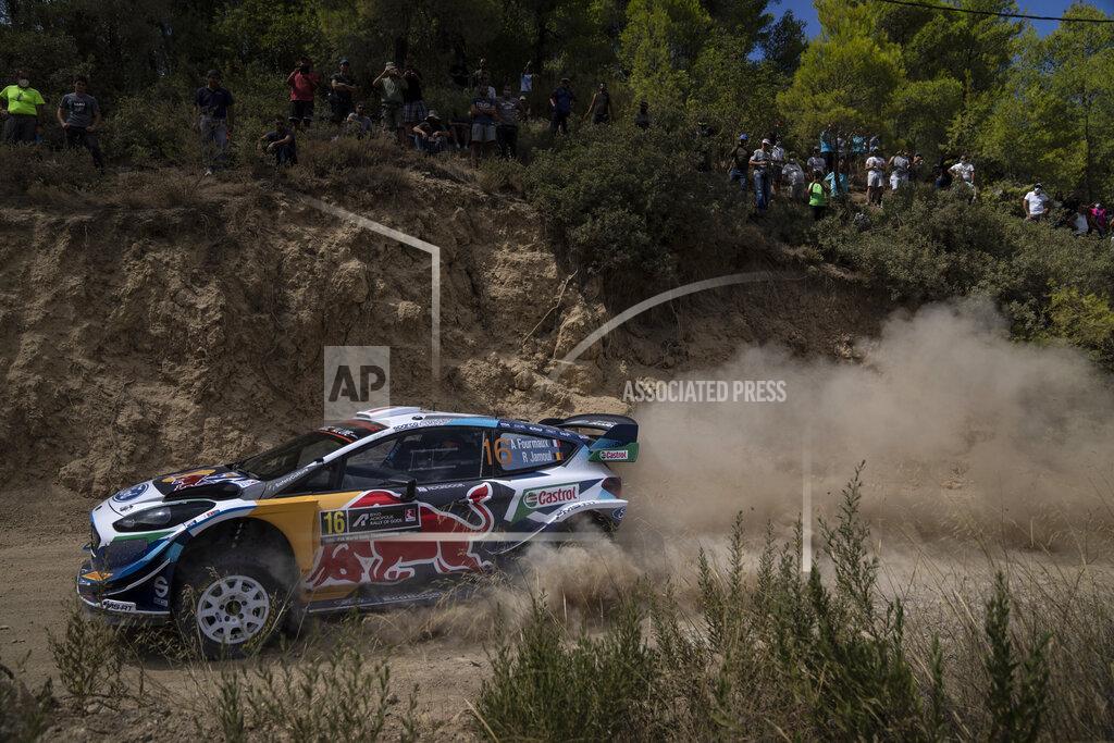 Petros Giannakouris Adrien Fourmaux of France with his co driver Renaud Jamoul of Belgium with their Ford Fiesta WRC car compete in the WRC Acropolis Rally at the stage of Aghii Theodori, west of Athens, on Friday, Sept. 10, 2021. The World Rally Championship returned to Greece after an eight-year absence. (AP Photo/Petros Giannakouris)